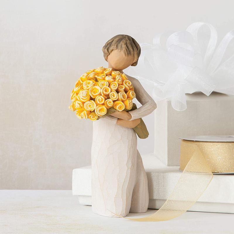 Ornement - Fille tenant un bouquet de fleurs