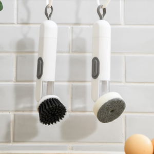 Brosse à pot avec distribution automatique de liquide