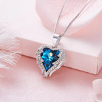 Boucle d'Oreille et Collier en forme de Coeur