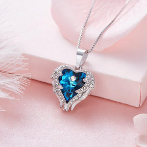 Boucle d'Oreille et Collier en forme de Coeur