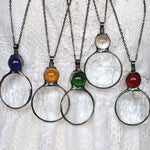 collier pendentif grande loupe